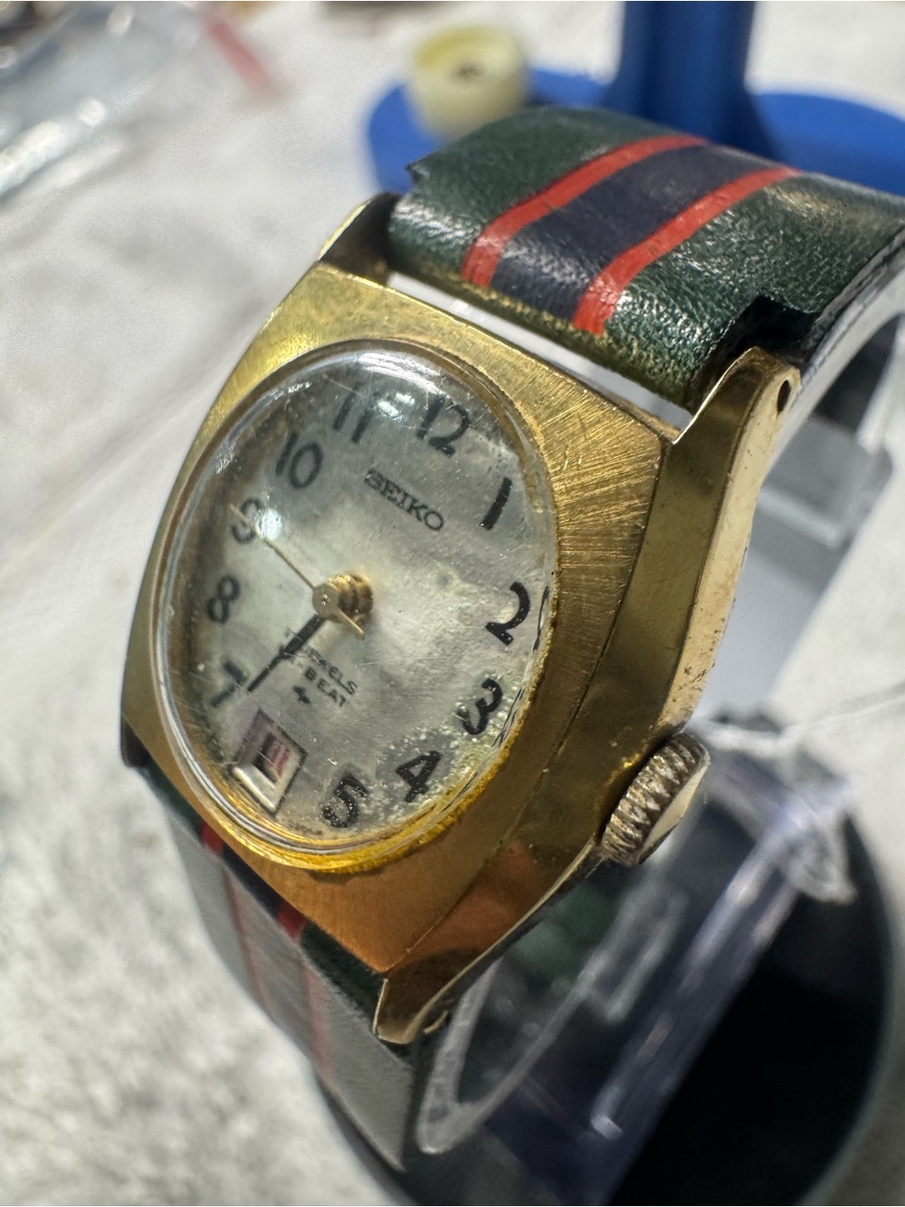 Seiko Gold-Tone Analog Watch with Green and Red Stripe Strap - Picture 3 of 8